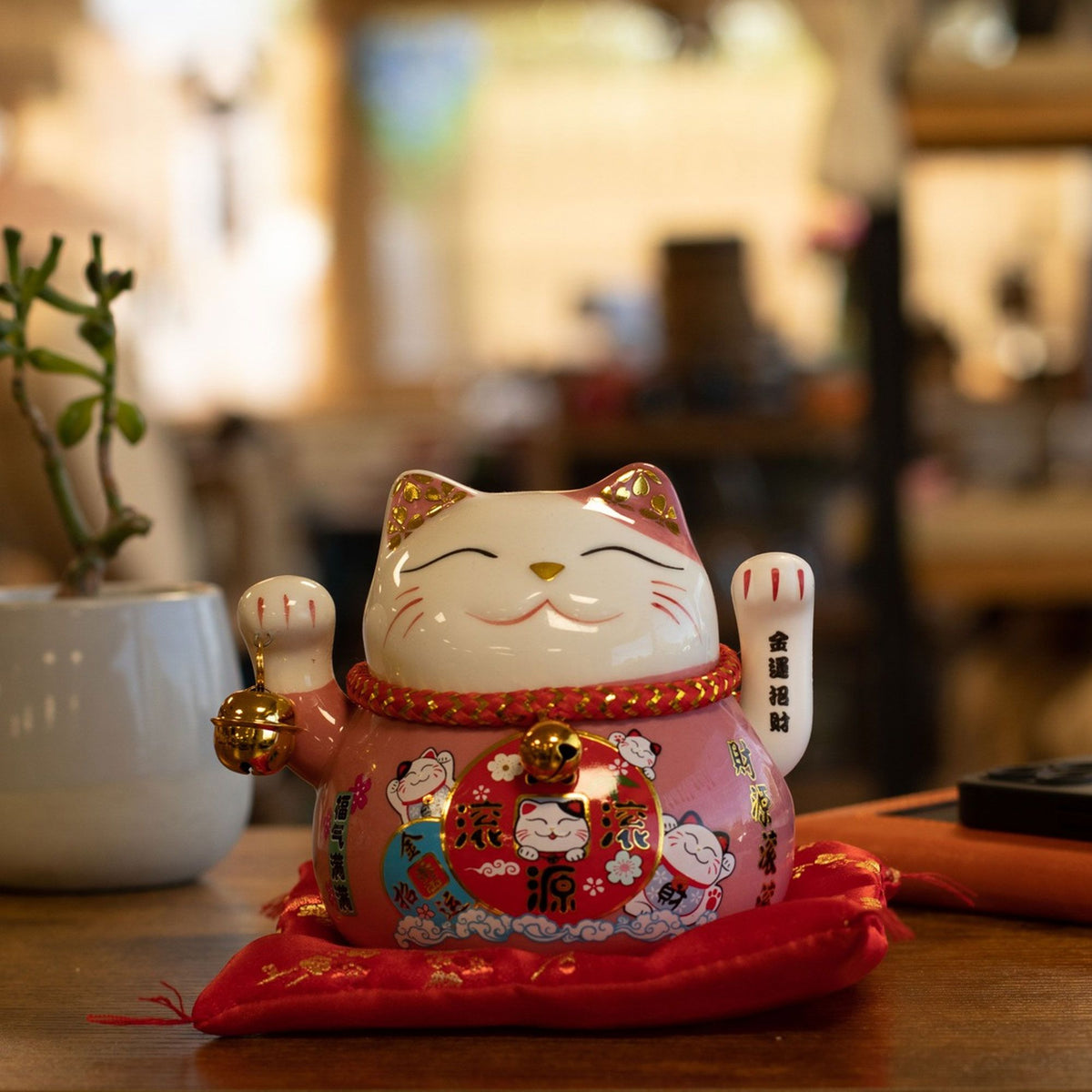Ceramic Money Cat Moving Hand - Pink on Cushion (battery not included)
